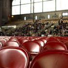 Red seats in an audience